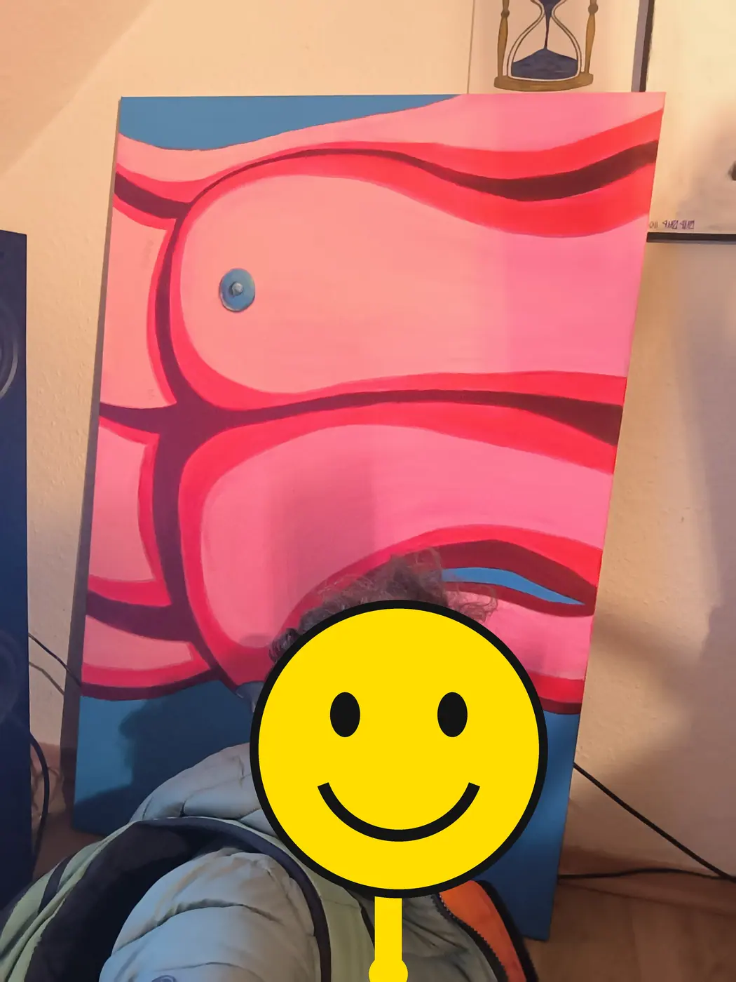 A visitor in front of a painting